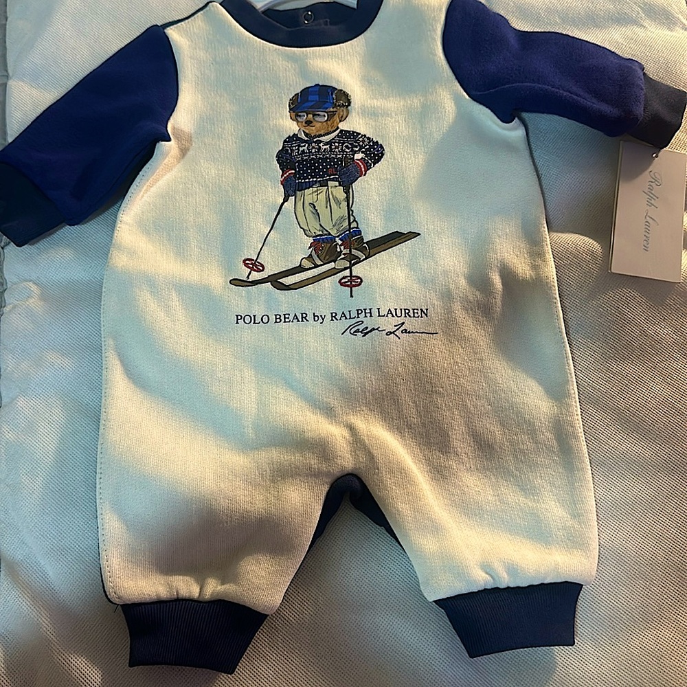 NB polo one piece nwt navy blue on the arms and back is dark blue